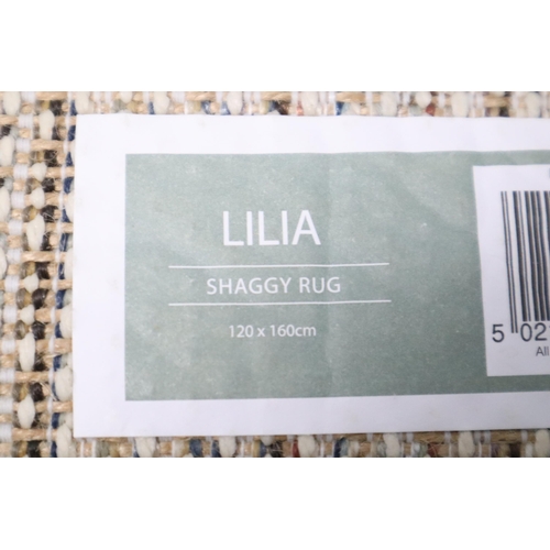 661 - A Lilia 120x160cm Shaggy Rug, In Light Cream