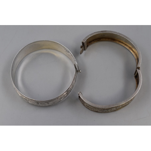 11 - Two Bangles To Include Sterling Silver Adjustable Bangle, And Unmarked Etched Bangle (Possibly Silve... 