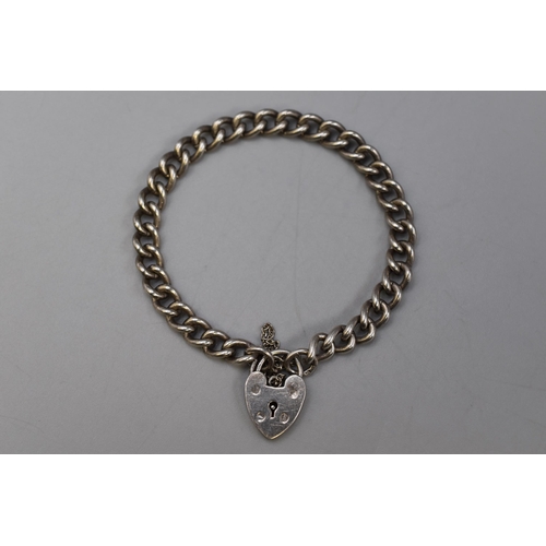 24 - Hallmarked Silver Curb Link Bracelet with Heart Locket and Safety Chain