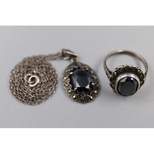 50 - A Pair of Sterling Silver Onyx and Marcasite Stoned Jewellery To Include Pendant Necklace and Ring