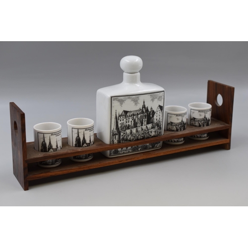 248 - A German Carafe set with 4 cups in wooden frame depicting Marburg castle, flask measures6