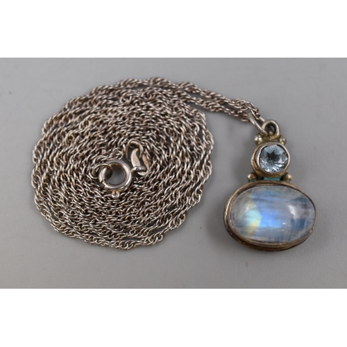 54 - A Sterling Silver Moonstone and Aquamarine Stoned Pendant Necklace