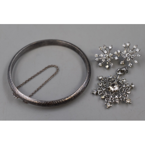 87 - Two Marked Silver Jewellery Items to include a earring and and Pendant set plus a Bangle