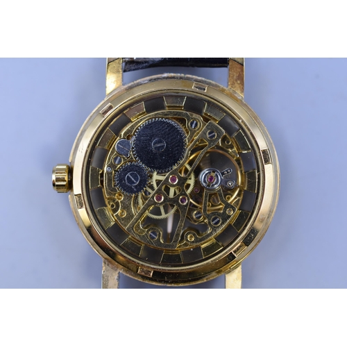 120 - A Gold Tone Mechanical Gents Skeleton Watch, Working