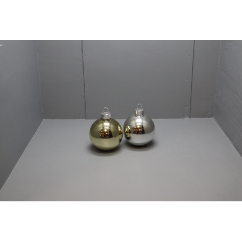 516 - Two Very Large Light Up Baubles (12” Dia)