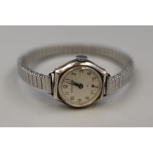 134 - A Hallmarked 1965 Birmingham Silver Cased Garrard 17 Jewels Ladies Mechanical Watch, South Eastern G... 