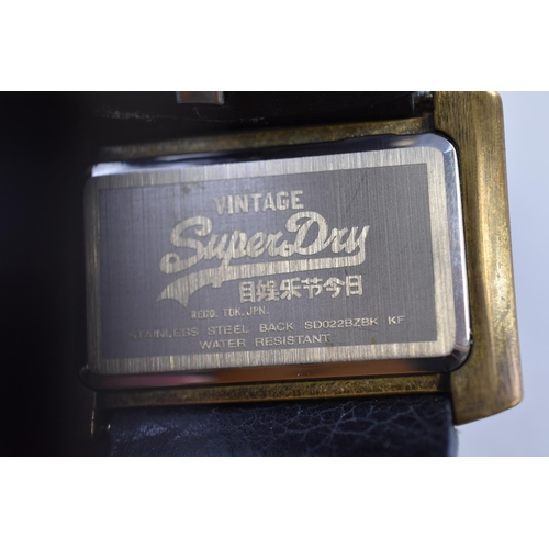 142 - Boxed Working Superdry Associated Gasoline Super Dry Oil Watch complete with Paperwork ticking away ... 