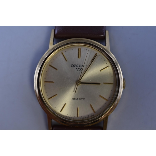 147 - An Orient VX Gent's Quartz Watch, Working