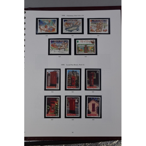 553 - Two albums mounted complete sets of stamps from the Isle of Man from 1958 to 2004 complete, in prist... 