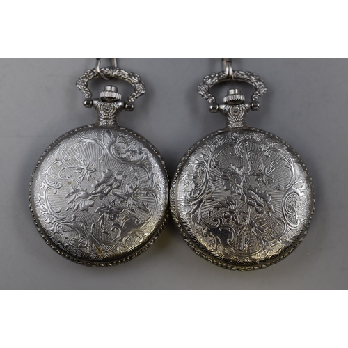 154 - Two Quartz Pocket Watches complete with Chains .