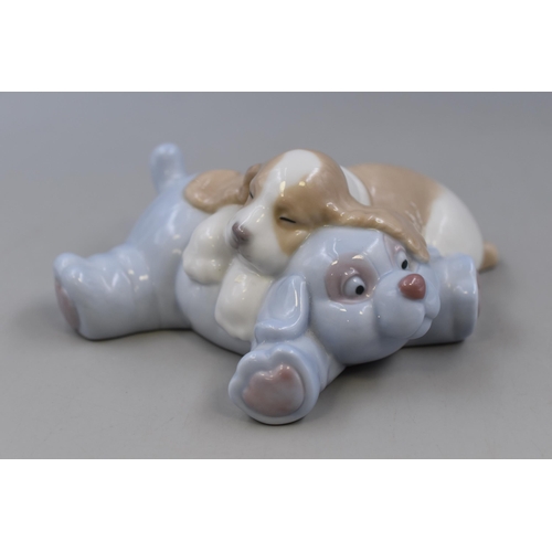 365 - A Nao figure of a sleeping puppy ''Dreamland Friends '' number 1462, modelled by Jose Santaeulalia, ... 