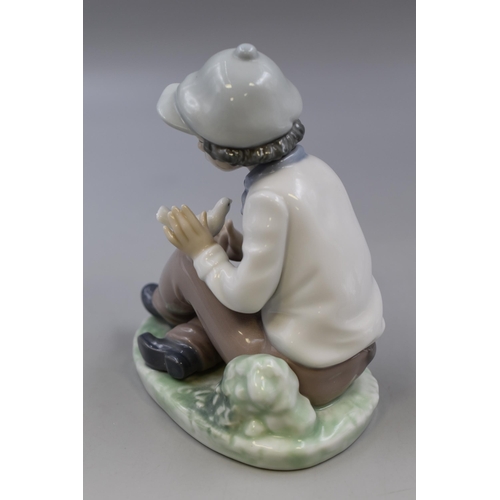 367 - Nao By Lladro Porcelain Figurine of Boy with Cap Seated with Dove (1990)