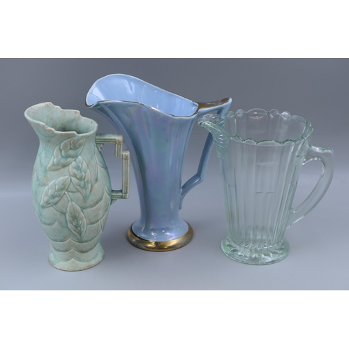 497 - Three Art Deco Jugs To Include 'Jean' Lustre Jug, 'Royal' Jug (AF), And Glass Jug. Largest Approx 9.... 