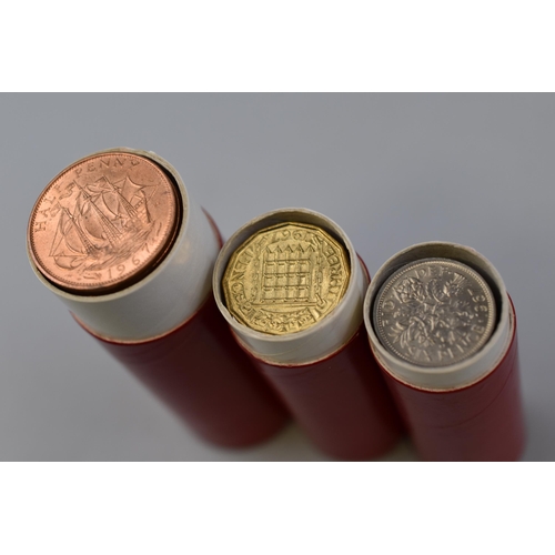 180 - Three Tubes of Mint UK Coins (50 Half Pennies, 50 Sixpences, 25 Threepences), With a Sixpence Pocket... 