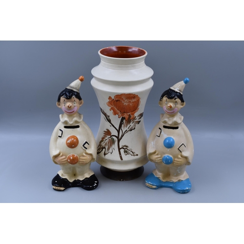 399 - Three Pieces of 1950's Ellgreave Pottery To Include Two Go Go Clown Money Boxes, and Mozek Vase. Vas... 