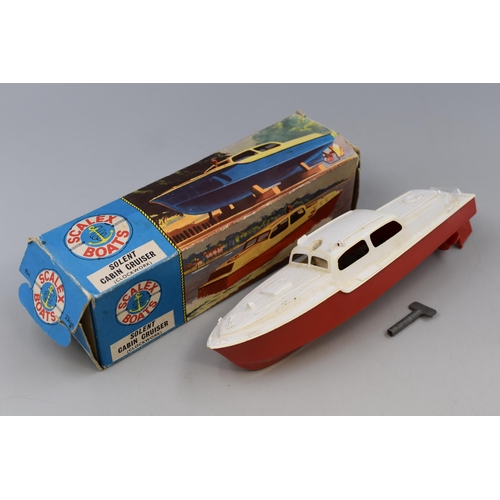 242 - A Boxed Scalex Boats Clockwork 425S Solent Cabin Cruiser, Working