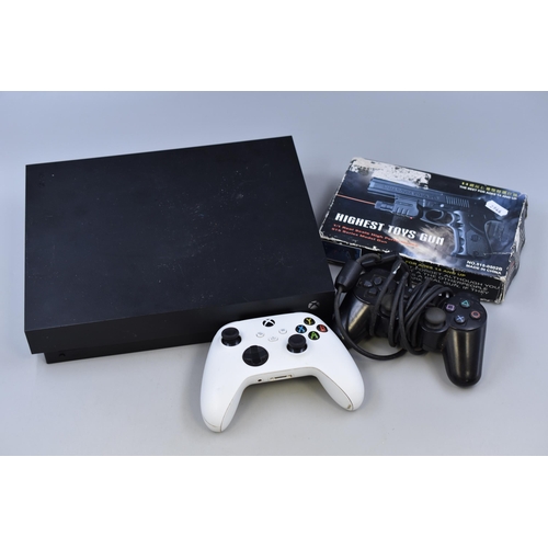 679 - Mixed Lot to include a Collection of Gaming Items to include Xbox One X (powers on when tested with ... 