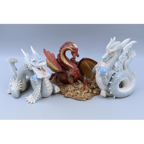 942 - A group of dragons. One is Enchantica (end of tail missing) the other two are Chinese dragons (one h... 