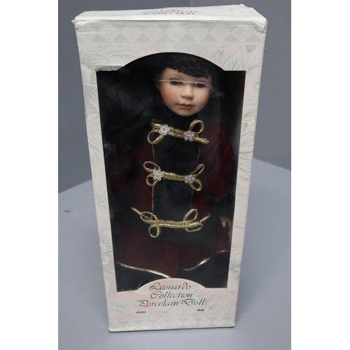 984 - Four Boxed Leonardo Porcelain Dolls To Include Celina, Andrew, Sleeping Beauty, And Other