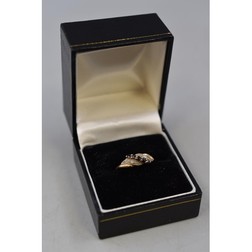 2 - Gold 9ct Clear and Blue Stoned Ring Complete with Presentation Box