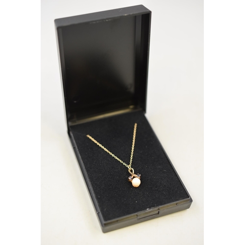 20 - Gold 375, Pearl and Dark Blue Stoned Pendant Necklace Complete with Presentation Box