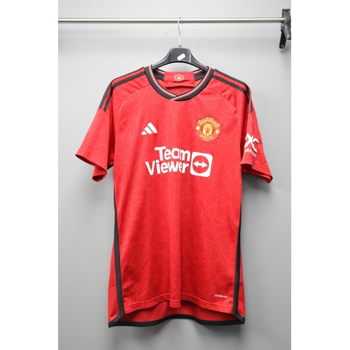 554 - Official Manchester United adidas Football Shirt (Size L)