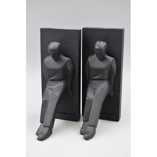 278 - Pair of Chris Collicott for Kikkerland Leaning Men Art Deco style bookends. Height 20cm.