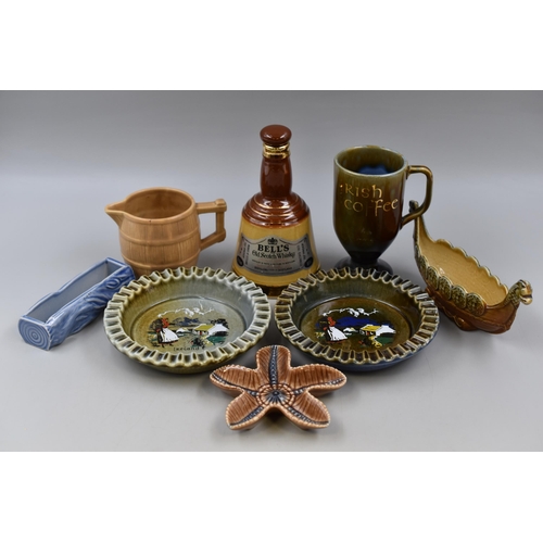 279 - A Selection of Wade Ceramics To Include Bells Whisky, Viking Ship, Irish Coffee Cup, And More. AF