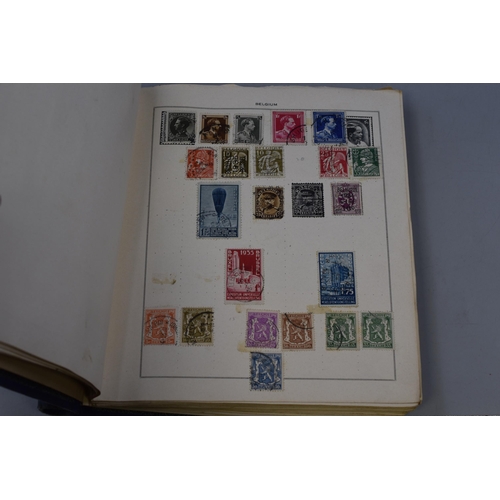 559 - Quickchange Illustrated Stamp Album containing worldwide Stamps including French, German, American a... 