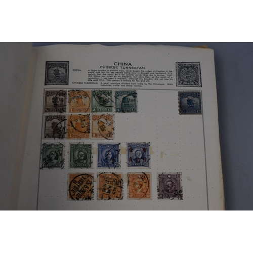 559 - Quickchange Illustrated Stamp Album containing worldwide Stamps including French, German, American a... 