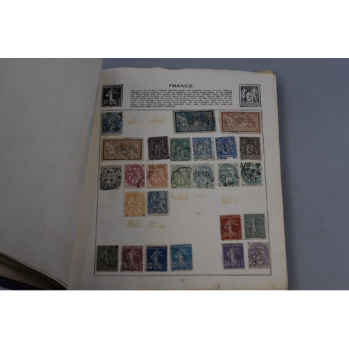 559 - Quickchange Illustrated Stamp Album containing worldwide Stamps including French, German, American a... 