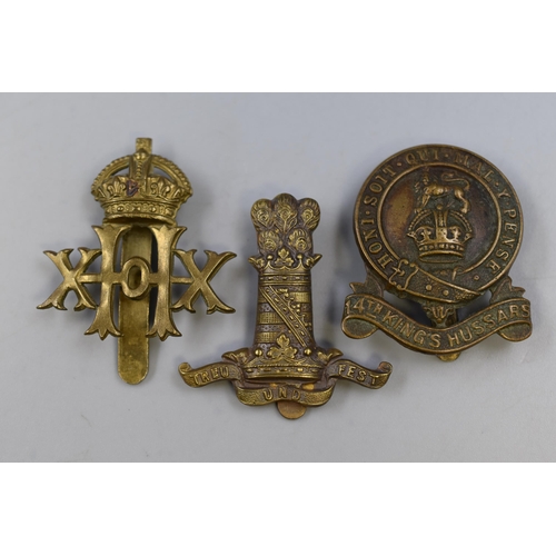 289 - Three Military Badges including 14th Kings Hussars, 11th Hussars and 20th Hussars