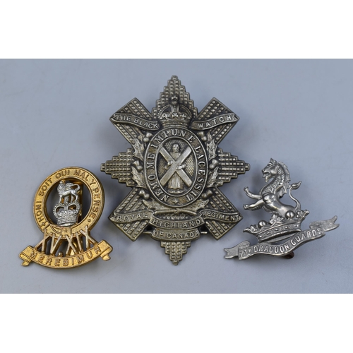 298 - Three Military Badges including 15th /19th Hussars, Canadian Black watch Royal Island Regiment, and ... 