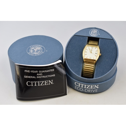 119 - A Gold Tone Citizen Eco-Drive Day/Time Quartz Watch, With Presentation Box. Working