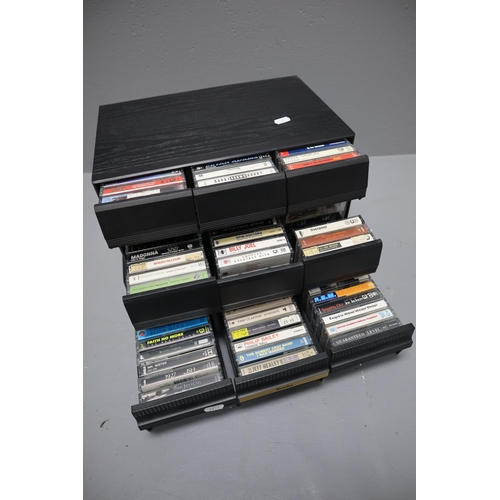 570 - A Selection of Cassette Tapes In Three Cassette Boxes To Include Eric Clapton, REM, Sting, Squeeze, ... 