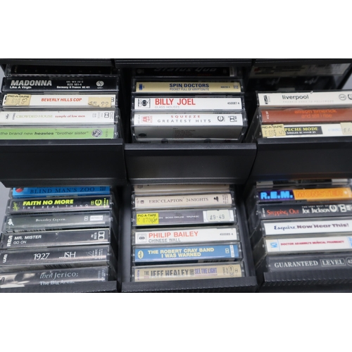 570 - A Selection of Cassette Tapes In Three Cassette Boxes To Include Eric Clapton, REM, Sting, Squeeze, ... 