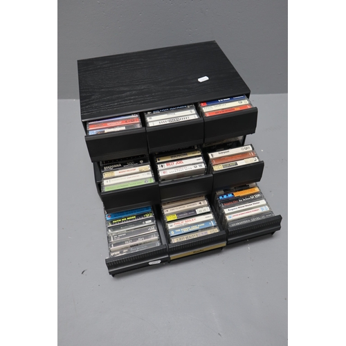 570 - A Selection of Cassette Tapes In Three Cassette Boxes To Include Eric Clapton, REM, Sting, Squeeze, ... 