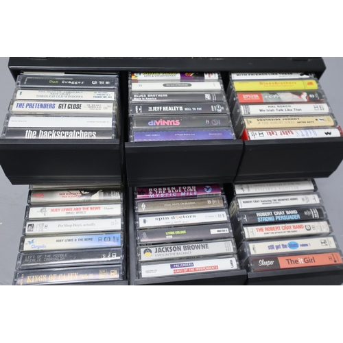 571 - A Selection of Cassette Tapes In Cassette Box To Include New Order, Pretenders, Simple Minds, Jackso... 