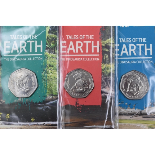 190 - Three Uncirculated Royal Mint 'Tales of The Earth' 50p Coins. Includes Megalosaurus, Hylaeosaurus, A... 