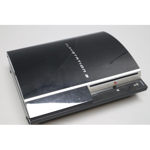 587 - A Sony PlayStation 3 Console, With Controller, Leads, And A Selection of Games. Powers On When Teste... 