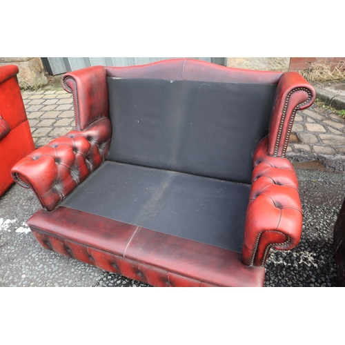 665 - Vintage Buttoned Rolled Arm Two Seater Leather Chesterfield in Oxblood on Castors a/f approx 50