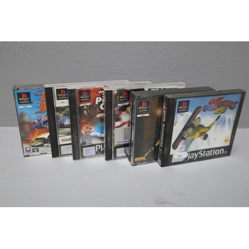 207 - Sony PlayStation 1 with Six Games to include Tomb Raider, Fifa 98 and More