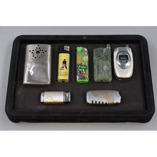 210 - Selection of Six Novelty Lighters and a Empire Made Hand Warmer