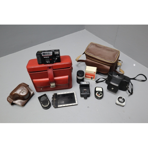 545 - A Selection of Cameras and Camera Accessories To Include Two Olympus Cameras, Camera Lens, Filters, ... 