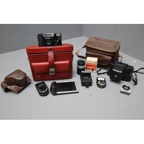 545 - A Selection of Cameras and Camera Accessories To Include Two Olympus Cameras, Camera Lens, Filters, ... 