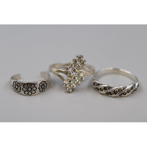 217 - Three 925. Silver Rings To Include Marcasite Stoned, Floral, And Other