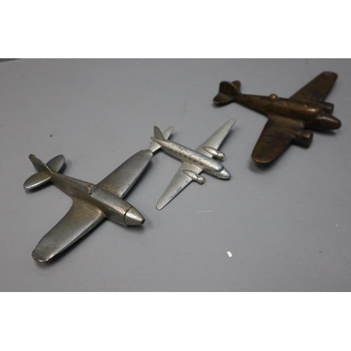 595 - A Selection of Various Model Planes To Include 1944 Messerschmitt, Two Metal Model Planes, USS Kitty... 