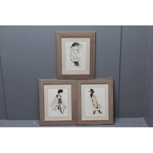 787 - Three charcoal sketches (possible fashion sketches) in beach wood frames, signed by designer (19