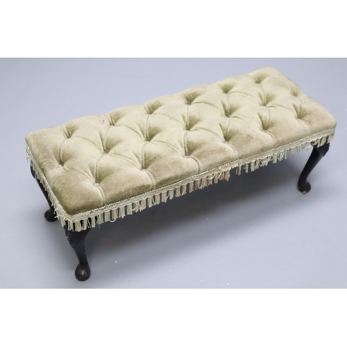 678 - A Green Velour Cushioned Ottoman/Footstool, With Tassels. Approx 11.5