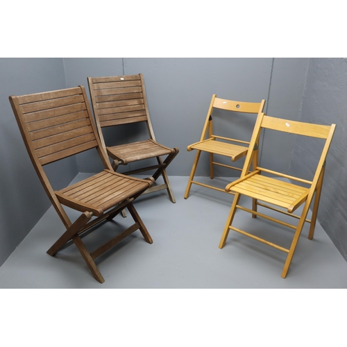 714 - Two Pairs of Folding Wooden Garden Chairs